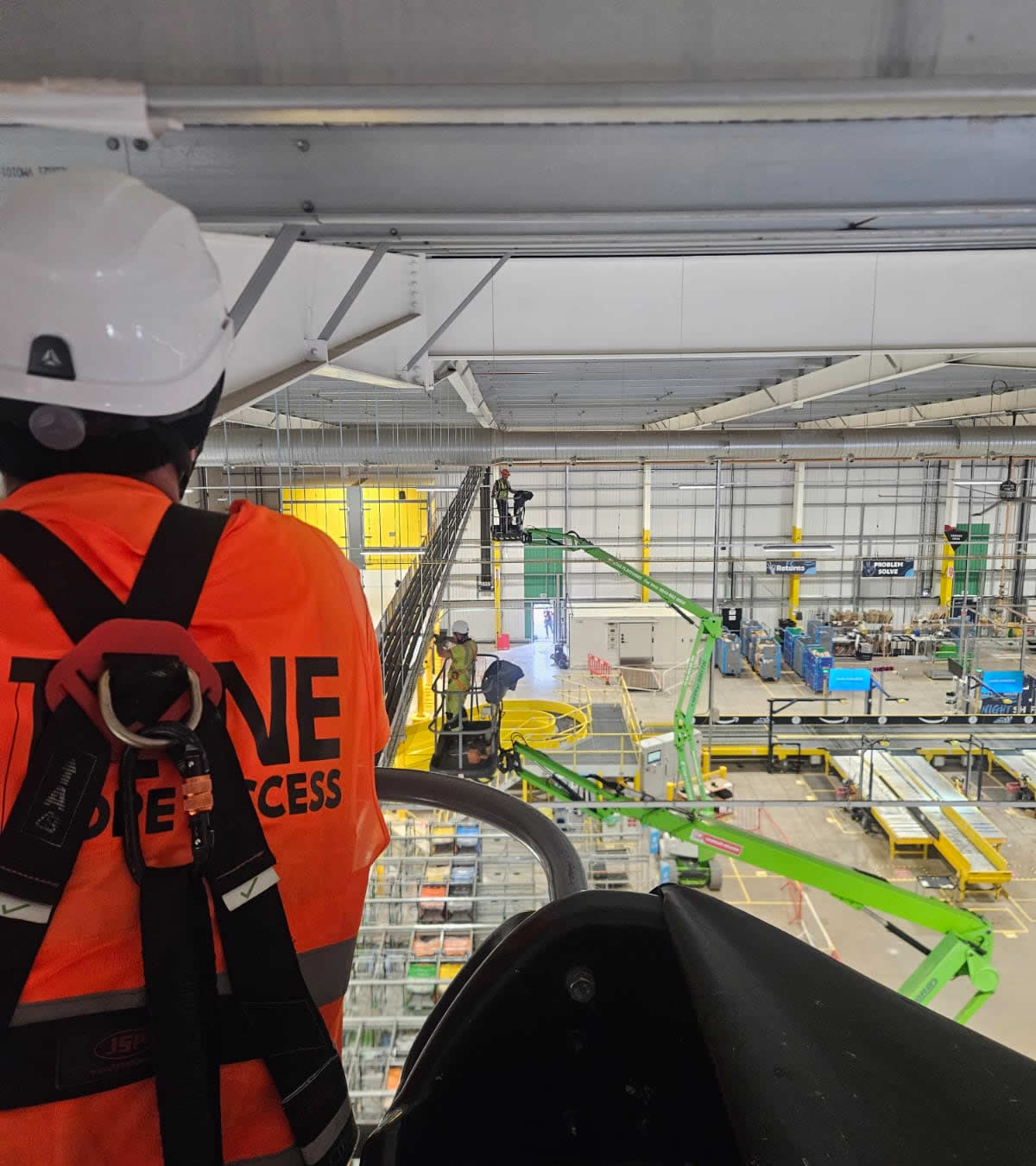 Tyne Rope Access team working at height inside the industrial unit